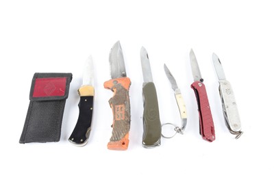 Lot 1007 - Victorinox DE-GM pocket knife, and 5 other...