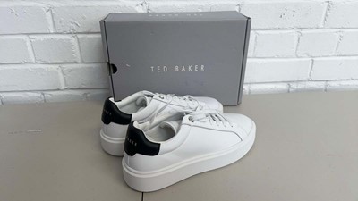 Lot 1769 - Boxed pair of Ted Baker trainers size UK 6