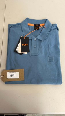 Lot 1845 - Hugo Boss 'BOSS' polo top in blue size L