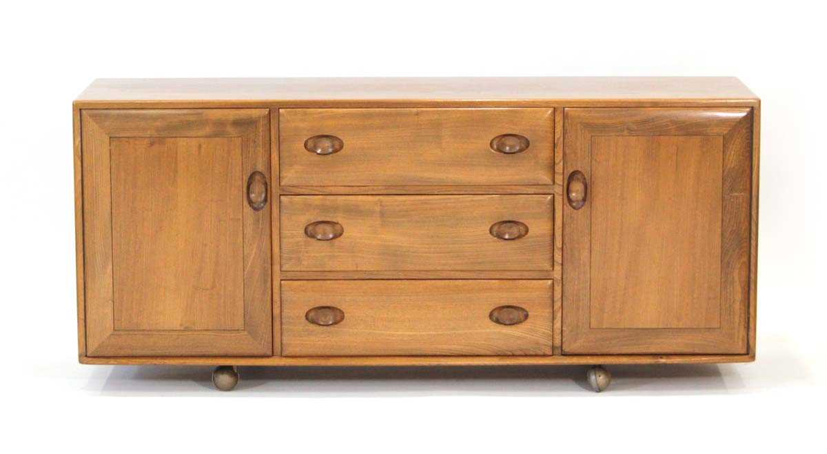 Lot 61 - An Ercol elm Windsor Range sideboard, the...