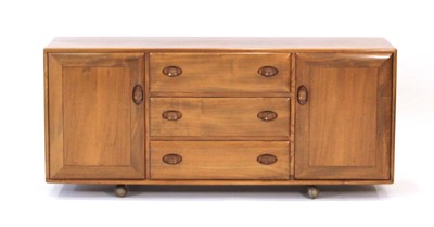 Lot 61 - An Ercol elm Windsor Range sideboard, the...