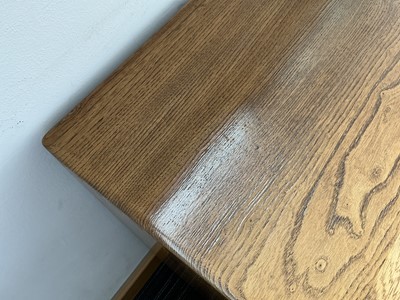 Lot 61 - An Ercol elm Windsor Range sideboard, the...
