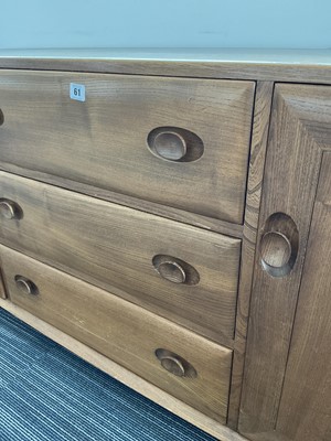 Lot 61 - An Ercol elm Windsor Range sideboard, the...