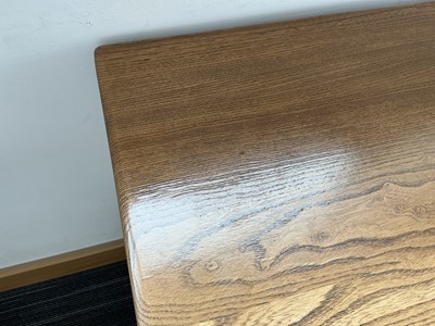 Lot 61 - An Ercol elm Windsor Range sideboard, the...