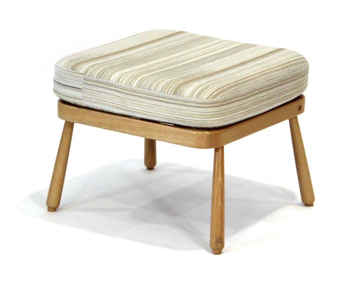 Lot 63 - An Ercol beech square stool on bulbous legs...