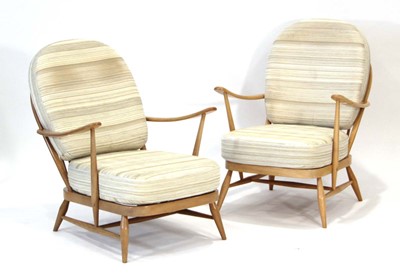 Lot 65 - A pair of Ercol elm and beech Model 305...