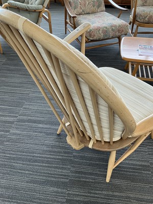 Lot 65 - A pair of Ercol elm and beech Model 305...