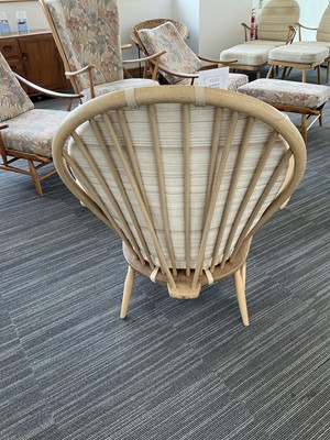 Lot 65 - A pair of Ercol elm and beech Model 305...
