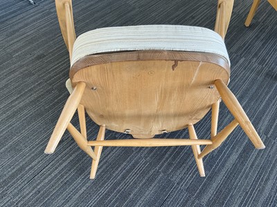Lot 65 - A pair of Ercol elm and beech Model 305...