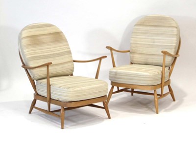 Lot 65 - A pair of Ercol elm and beech Model 305...