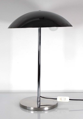 Lot 112 - A Swiss polished chrome table lamp by Lumess,...