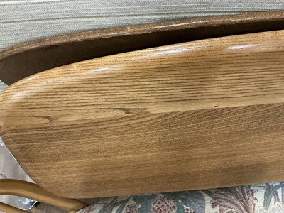 Lot Lucien Ercolini for Ercol, an elm and beech...