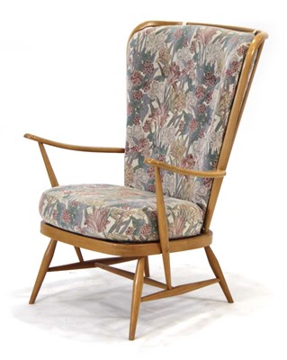 Lot 168 - An Ercol 'Windsor' Range beech fireside...