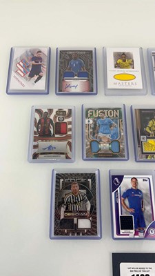 Lot 1483 - 12 Top Loaded 'Patch' Football trading cards...