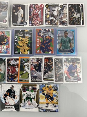 Lot 1489 - Approx. 33 slabbed, top loaded, and sleeved...