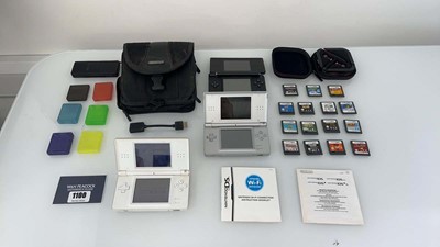 Lot 1100 - 3x Nintendo DS consoles, qty of games to...