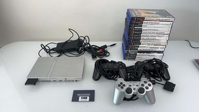 Lot 1140 - PlayStation 2 Slimline with qty of games