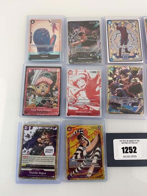 Lot 1252 - 14 Top Loaded One Piece TCG cards from various...