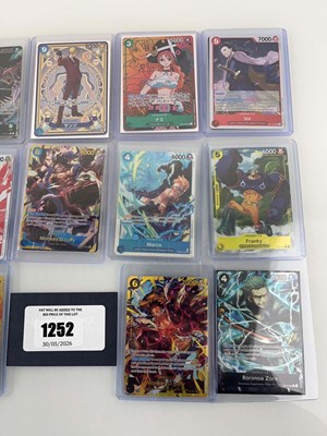 Lot 1252 - 14 Top Loaded One Piece TCG cards from various...