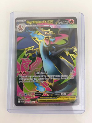 Lot 1264 - (3) Top Loaded Pokémon TCG Charizard Cards:...