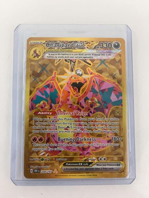 Lot 1264 - (3) Top Loaded Pokémon TCG Charizard Cards:...