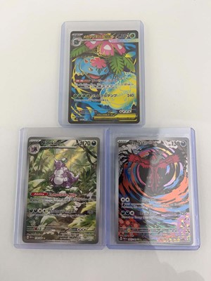 Lot 1267 - (6) Top Loaded Pokémon TCG cards from various...