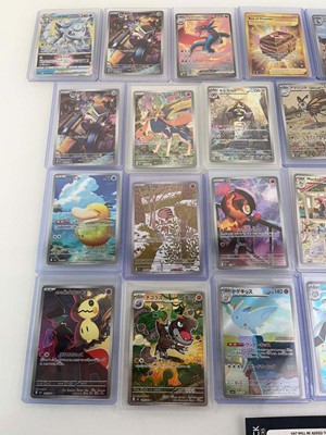 Lot 1420 - Approx. 25 Top Loaded Pokémon cards from...