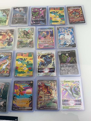Lot 1421 - Approx. 25 Top Loaded Pokémon cards from...