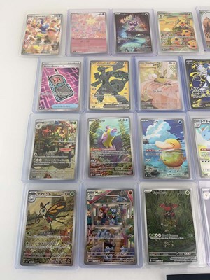Lot 1422 - Approx. 25 Top Loaded Pokémon cards from...