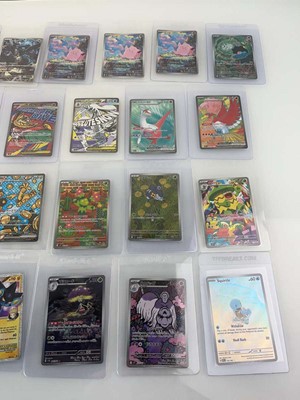 Lot 1423 - Approx. 25 Top Loaded Pokémon cards from...