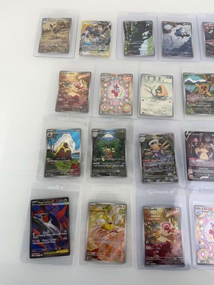 Lot 1424 - Approx. 25 Top Loaded Pokémon cards from...