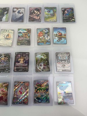 Lot 1424 - Approx. 25 Top Loaded Pokémon cards from...