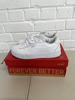 Lot 1733 - Boxed pair of Puma 'crew snake' trainers size...