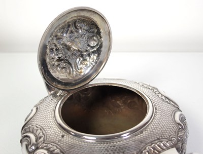 Lot 200 - A Regency silver teapot of squat form with...