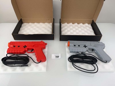 Lot 1153 - 2x Sinden Light Guns with Recoil Effect in red...