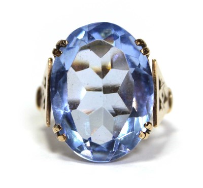 Lot 627 - A 9ct yellow gold dress ring set oval pale...