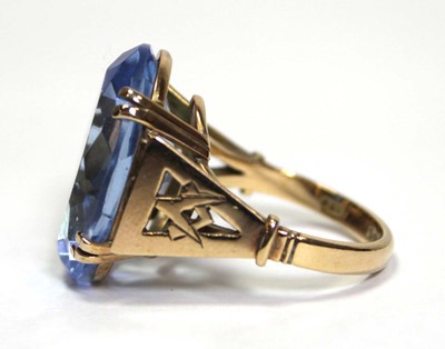 Lot 627 - A 9ct yellow gold dress ring set oval pale...