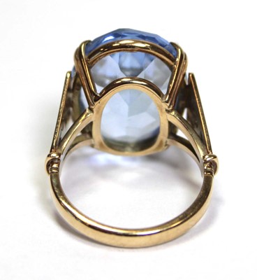 Lot 627 - A 9ct yellow gold dress ring set oval pale...