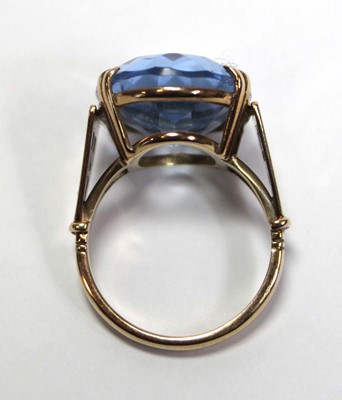 Lot 627 - A 9ct yellow gold dress ring set oval pale...