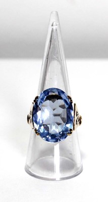 Lot 627 - A 9ct yellow gold dress ring set oval pale...