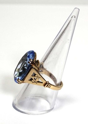 Lot 627 - A 9ct yellow gold dress ring set oval pale...