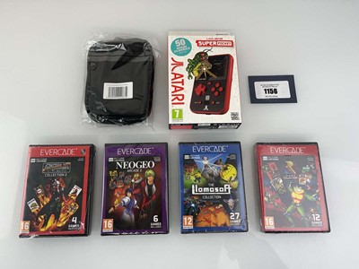 Lot 1156 - Atari Super Pocket handheld console together...