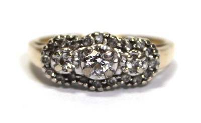 Lot 631 - A 14ct yellow gold ring set small diamonds in...