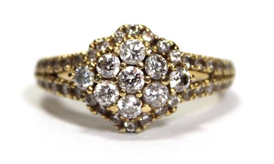 Lot 632 - An 18ct yellow gold cluster ring set small...