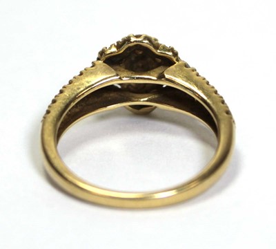 Lot 632 - An 18ct yellow gold cluster ring set small...