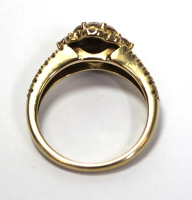 Lot 632 - An 18ct yellow gold cluster ring set small...