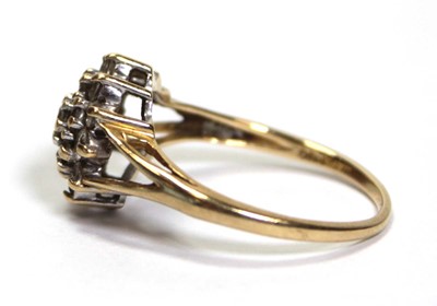Lot 633 - An 18ct yellow gold cluster ring set small...