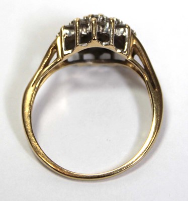 Lot 633 - An 18ct yellow gold cluster ring set small...