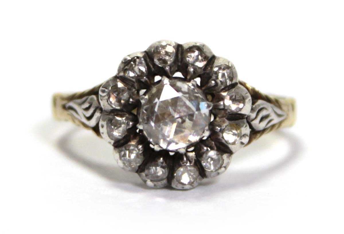 Lot 634 - A Dutch 14ct yellow gold cluster ring set rose...