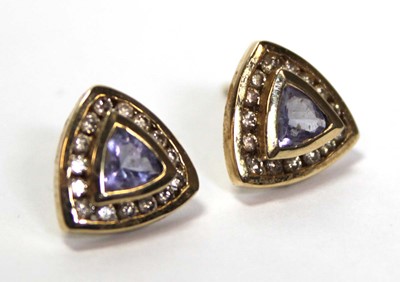 Lot 639 - A pair of 14ct yellow gold ear studs, each set...
